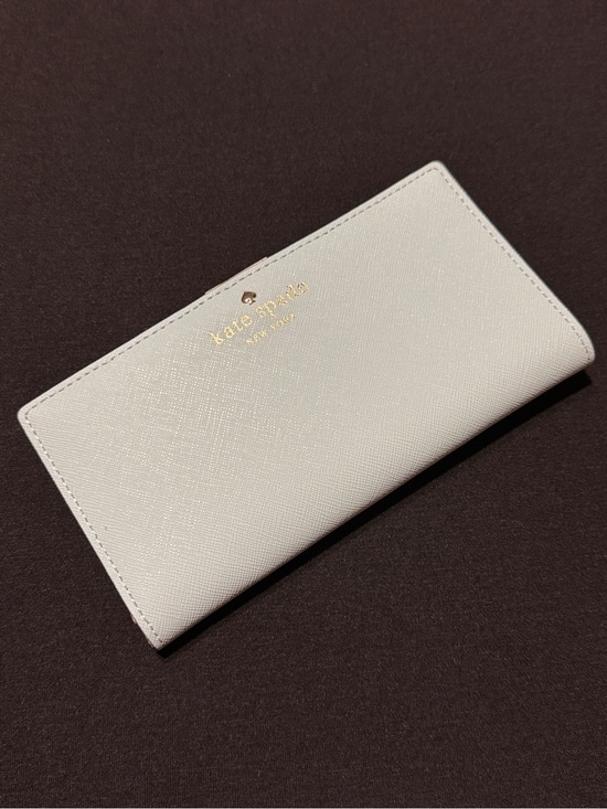 kate spade Handbags - A Kate Spade Baby Blue Wallet with Gold Logo